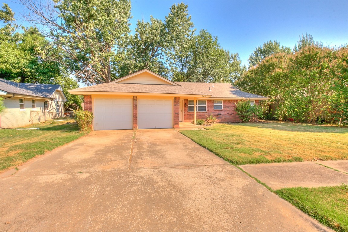 This home is located in a quiet area of Norman! Just a couple blocks east of the campus of OU, with easy access to HWY 9. This home has a 2-car garage. Enter the living area with plenty of natural light and laminate wood flooring throughout the main areas of the home. Spacious dining room space and kitchen with a refrigerator, oven, stove, microwave, and dishwasher. Backyard access is off the dining room bringing in lots of natural light. Large backyard with two mature trees, and a bricks area as soon as you step out. All three bedrooms have carpet and ceiling fans. The garage door does not automatically open. Will have to be manually opened/shut. Small dog allowed upon approval. The security deposit is $1,250. This is a non-smoking unit. The new lease will go through May 31st, 2024.