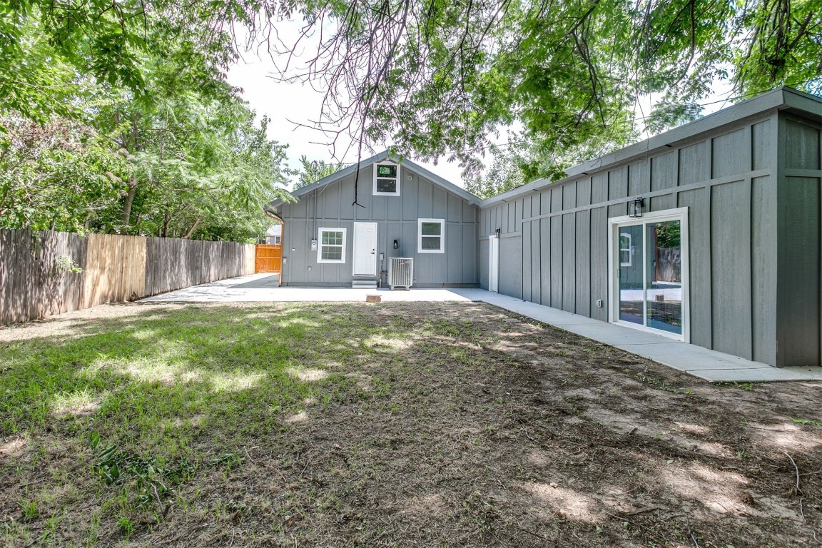 615 E Gray Street, Norman, OK 73071 yard featuring central AC