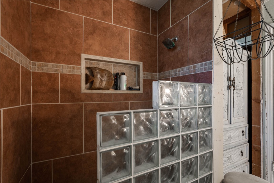 12345 SW 42nd Street, Mustang, OK 73064 bathroom featuring a shower
