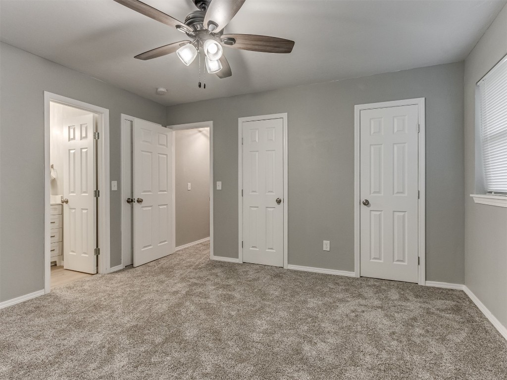 608 SW 26th Street, El Reno, OK 73036 bedroom featuring carpet and a ceiling fan