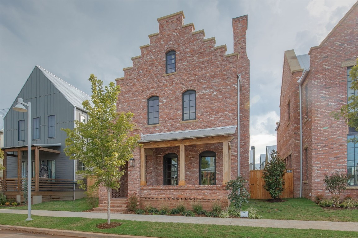 This Dutch inspired home in the heart of Wheeler District is built to last for centuries. Using the age-old practice of structural masonry, it is composed of sixteen inch thick walls and 90,000 bricks. From the first steps you’ll experience old world charm, a rare find in today's world. The first floor boasts eleven foot tall exposed brick walls and a great room framed by a hand crafted brick archway. With commercial grade appliances, marble and quartz countertops the kitchen boasts traditional elegance. The second floor hosts the primary suite and secondary bedrooms and guest bath. With aluminum clad windows, geothermal heat and air you will enjoy modern energy efficiencies. A ground level brick courtyard offers space for outside entertaining for evenings al fresco. Knowing this home will only become richer in years to come, there is a sense of comfort that cannot be duplicated.