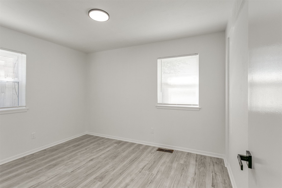 2600 SW 65th Street, Oklahoma City, OK 73159 empty room featuring light hardwood flooring