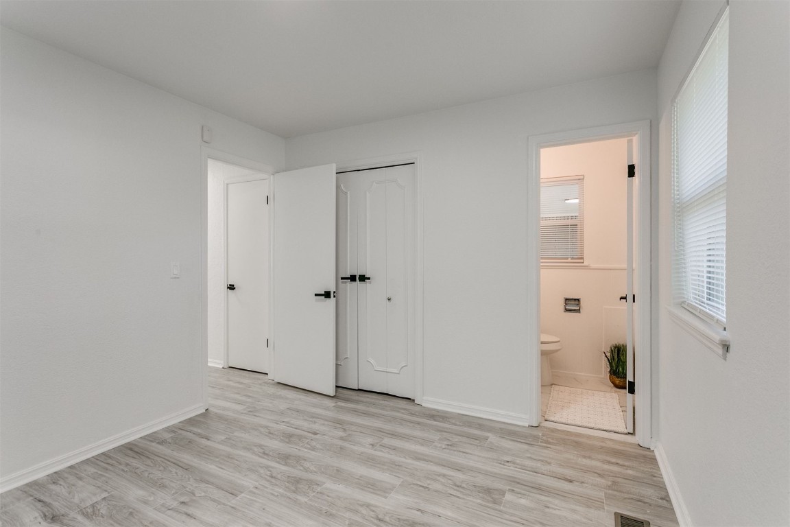 2600 SW 65th Street, Oklahoma City, OK 73159 bedroom featuring light hardwood floors