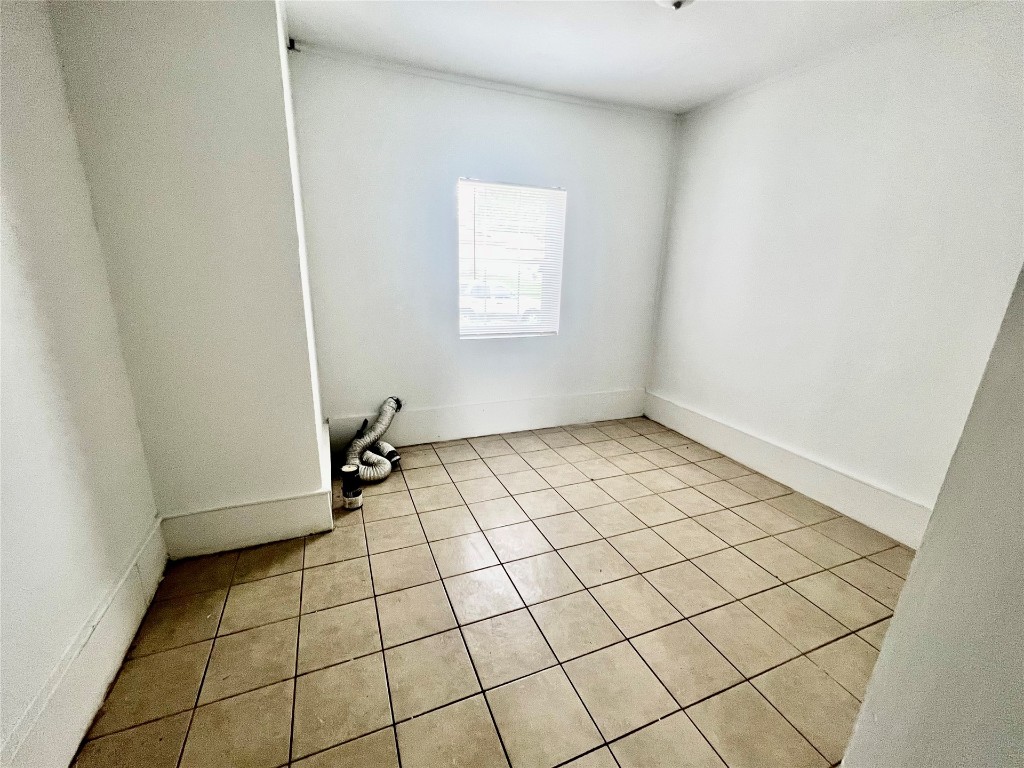 1520 Mcgregor Drive, Midwest City, OK 73130 unfurnished room with light tile floors