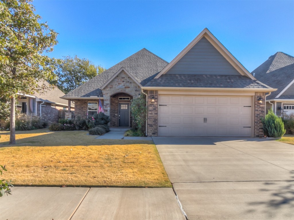 HERE IS THE HOME YOU HAVE BEEN LOOKING FOR WITH ALL THE AMENTIES AND UPGRADES IN THE HIGHLY DESIREABLE MONARCH RIDGE NEIGHBORHOOD.   THIS HOME BEGINS WITH A PROFESSIONALLY LANDSCAPED FRONTYARD, OVERSIZED FRONT PATIO AND WITH DECORATIVE RUSTIC RAILING.  THE ENTRY WAY BOASTS A WOOD BEAM CEILING AND SLIDING BARN DOOR INTO THE STUDY, LARGE OPEN AREA IN THE KITCHEN AND LIVING ROOM, H.E.R.S. ENERGY EFFICIENT RATED HOME, ZONED SPRINKLER SYSTEM, INGROUND STORM SHELTER LOCATED IN THE GARAGE FLOOR,  NEUTRAL COLOR PALETTE THROUGHOUT, STUDY CAN BE FLEX ROOM, WOOD BLINDS, LARGE TREED BACKYARD, WHIRLPOOLS APPLIANCES, LARGE BREAKFAST BAR THAT CAN ACCOMODATE BAR STOOLS,  NEW CARPET JUST INSTALLED IN STUDY & MASTER, AND NUMEROUS OTHER FEATURES.   THIS HOME IS LOCATED IN THE AWARD WINNING DEER CREEK SCHOOL SYSTEM, 1 MILE AWAY FROM A MAJOR HIGHWAY FOR EASY OF CONVENIENCE OF RESTAURANTS, COMMUTING, AND SHOPPING.  THIS IS TRULY A BEAUTIFUL HOME!