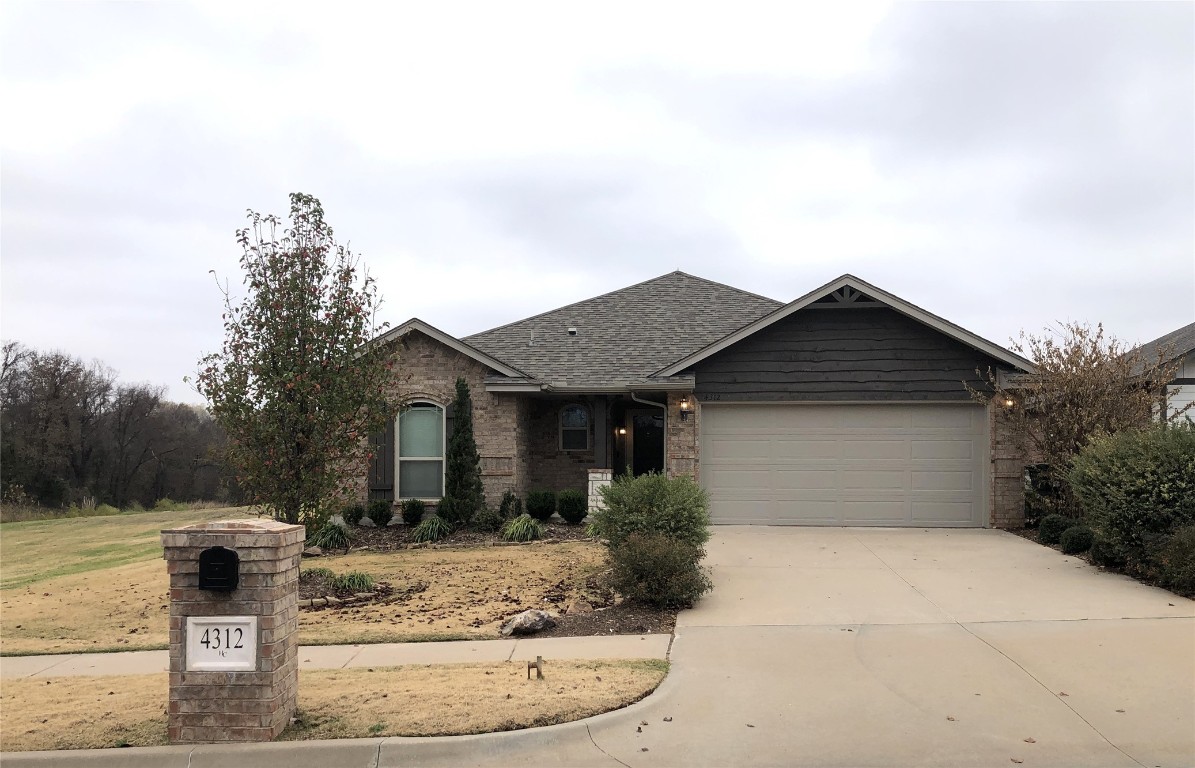 MODEL HOME! These don't last long! Great home on a large homesite, with an irrigation system, storm shelter, AC & Heat in the garage, alarm system, 2" white faux wood blinds, engineered wood floors in the main areas, and so much more! This will be a wonderful place to call home!
