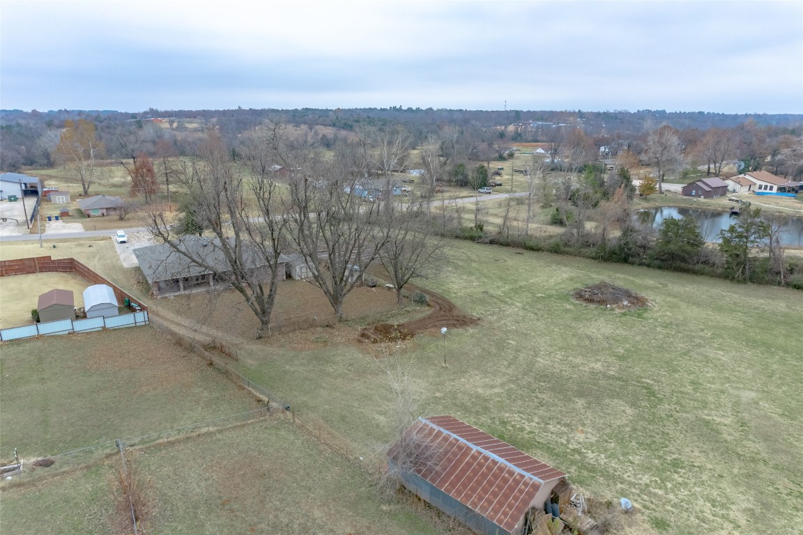 715 Edgewood Drive, Choctaw, OK 73020 birds eye view of property featuring a water view