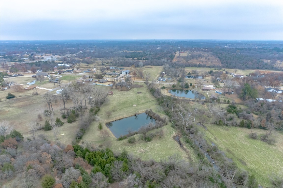 715 Edgewood Drive, Choctaw, OK 73020 aerial view with a water view