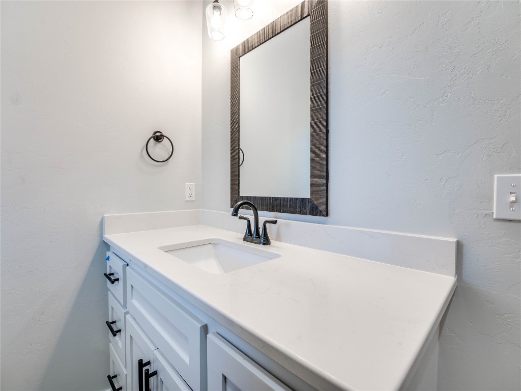 124 W Lynn Court Drive, Mustang, OK 73064 bathroom with vanity