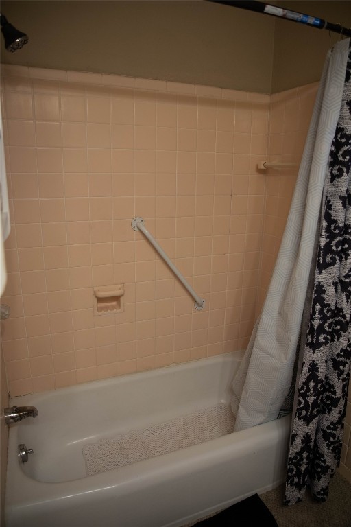 107 Cimarron Road, Burns Flat, OK 73647 bathroom with shower / bath combination with curtain