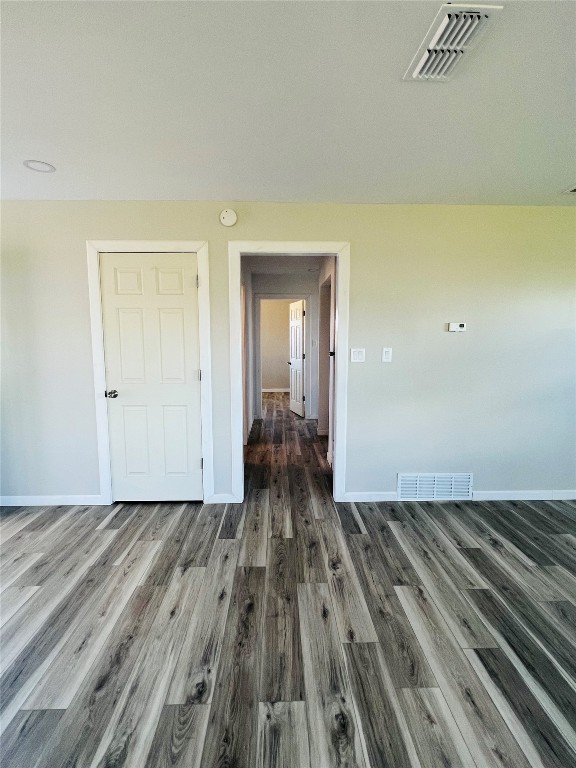 113 Osage Road, #B, Burns Flat, OK 73647 unfurnished room featuring dark wood-type flooring