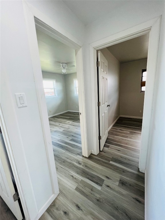 113 Osage Road, #B, Burns Flat, OK 73647 hallway with dark wood-type flooring