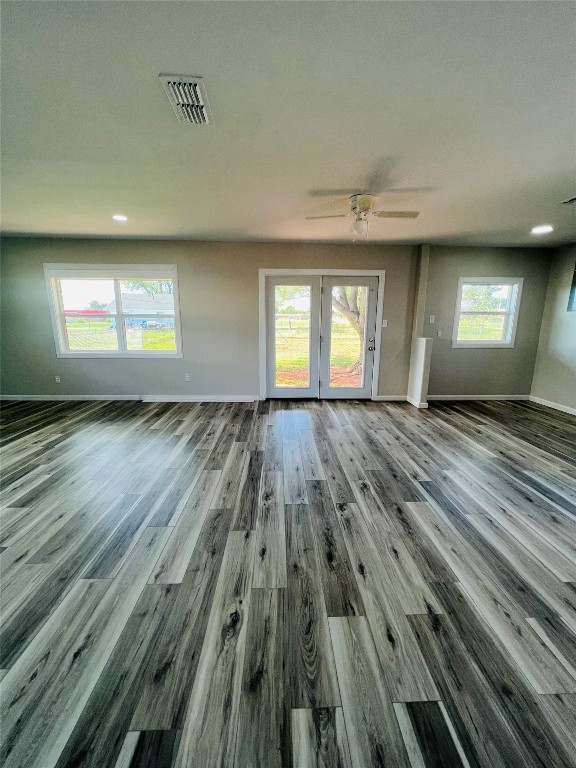 113 Osage Road, #B, Burns Flat, OK 73647 spare room with dark hardwood / wood-style floors and plenty of natural light