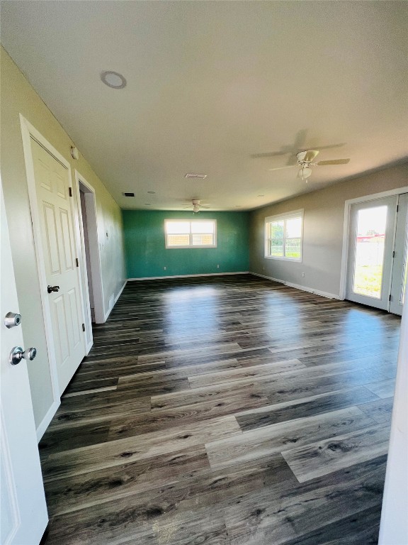 113 Osage Road, #B, Burns Flat, OK 73647 spare room featuring dark hardwood / wood-style flooring and ceiling fan