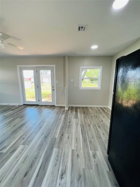 113 Osage Road, #B, Burns Flat, OK 73647 unfurnished room featuring light hardwood / wood-style flooring and ceiling fan