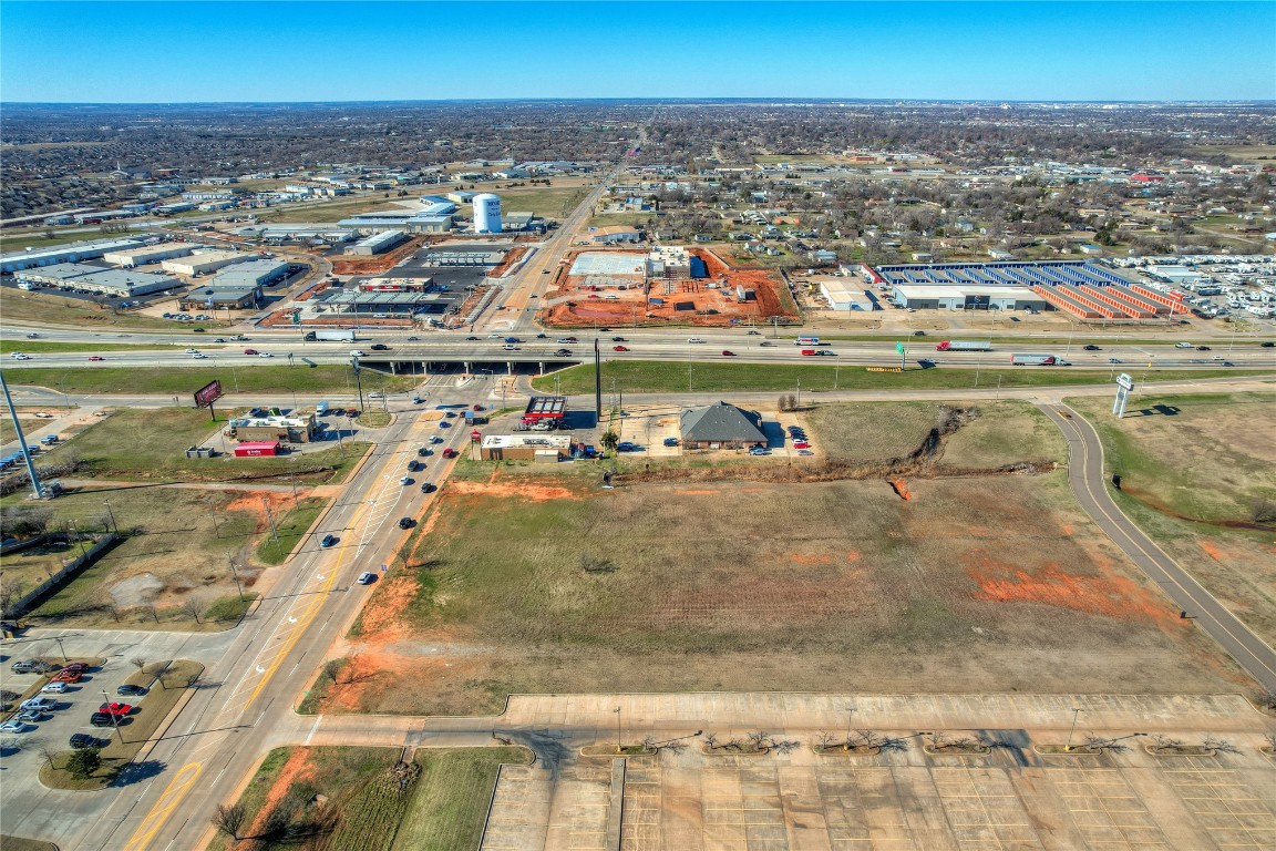 Exceptional location within the I-35 corridor, easy off and on both northbound and southbound lanes. Thriving area teaming with new life and opportunities.  2.15 Acres, zoned C-3.  65' Pole signs allowed. This property is close to Starbucks, Casey's, QuikTrip, Social Security office and more.  Click the video link for a more detailed look at the property. 

Per day traffic count:
NE 27th   14,000+
I-35      109,000+,  

      12 " Water along NE 27th     8" Sanitary sewer at corner of NE 27th and I-35