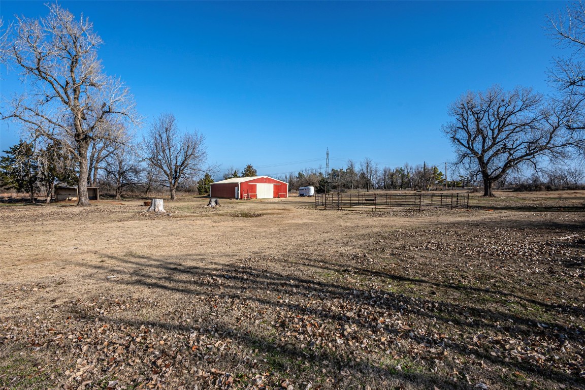 3735 Janet Circle, Mustang, OK 73064 view of yard with a rural view