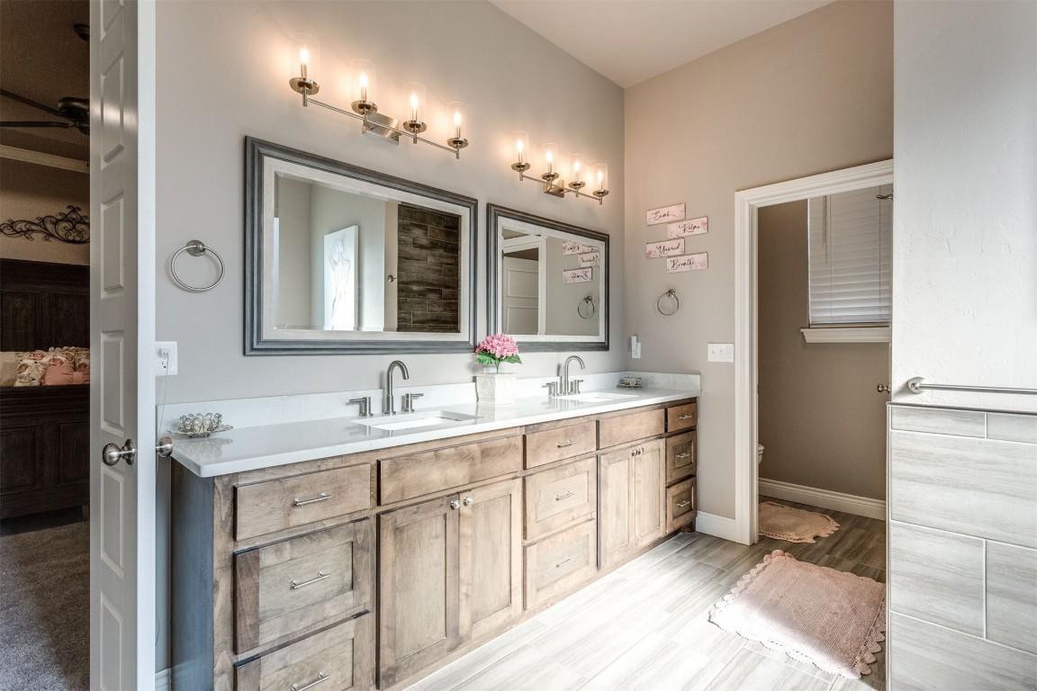 3910 Sienna Ridge, Newcastle, OK 73065 bathroom featuring dual vanity