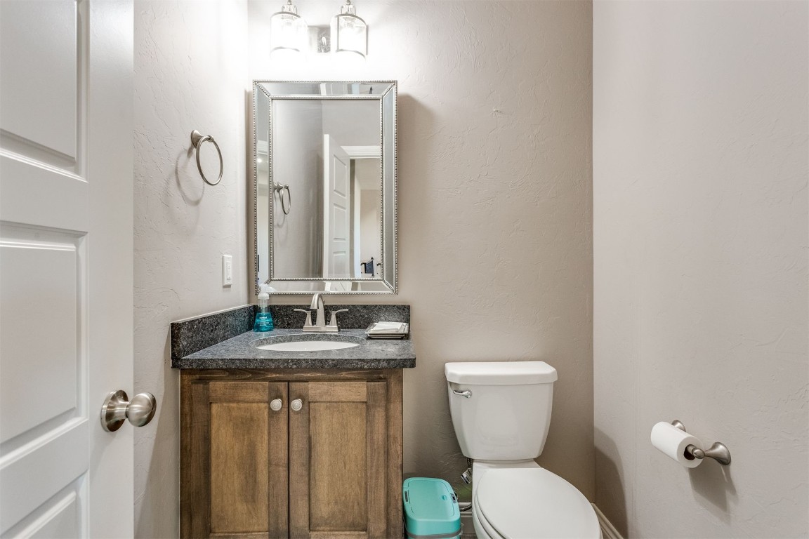 3910 Sienna Ridge, Newcastle, OK 73065 bathroom featuring toilet and vanity with extensive cabinet space