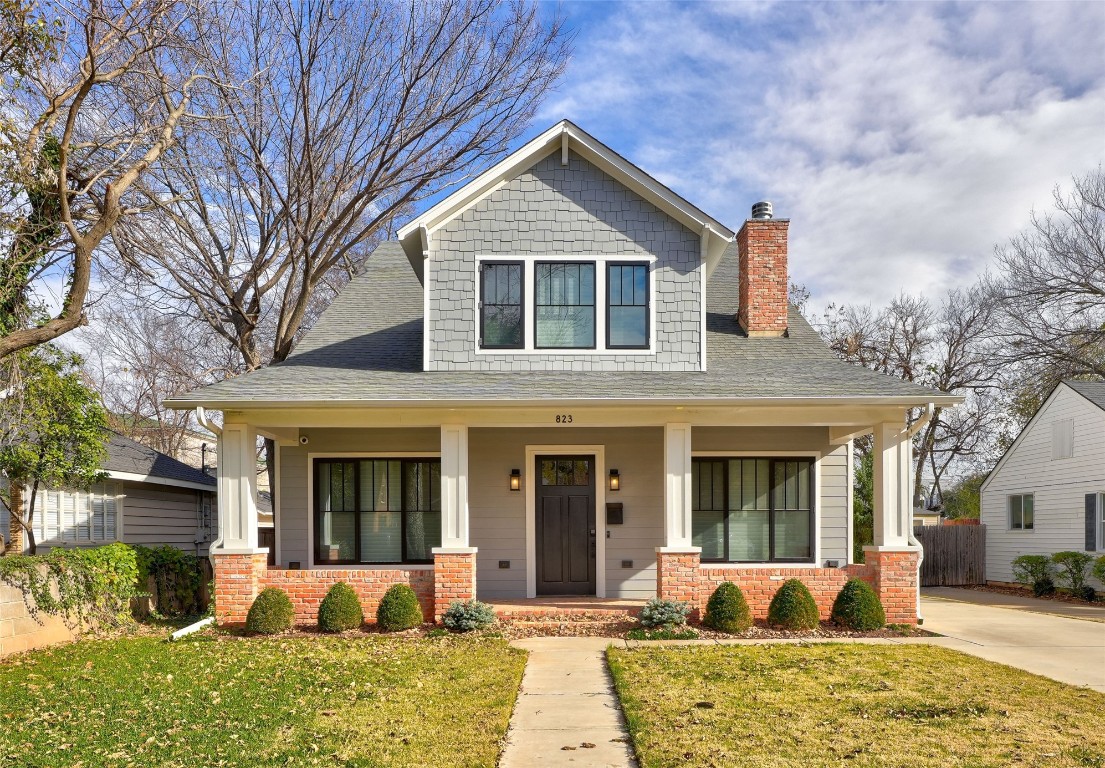 Within walking distance of the University of Oklahoma, this stunning Bungalow-style Smart Home stands above the rest! Built in 2017, you immediately notice the quality of construction and high-end appliances throughout. Historical landscaping in the front and backyard compliments this home. Open concept living/dining/kitchen area. High ceilings and multiple windows with 3-inch "Hunter Douglas" cloth blinds provide warm sunlight to the living room. Hardwood flooring, large baseboards, 4-inch crown molding all around, lots of canned lighting, gas-log fireplace with extra large mantle, accented chandelier for dining, and unique lighting for the kitchen. The kitchen has a very large island that features a breakfast bar, double-sink, commercial microwave and dishwasher. Commercial grade "Wolf" gas stove with hood, commercial grade "Sub-Zero" refrigerator, wine cooler, large pantry, and granite countertops complete the kitchen experience. Security/Exercise/Security room, half-bath, office, master bedroom, laundry room, and mud area are located on the first floor. The security room has a security door with multiple deadbolts, lighting, venting, and communication hookups for all emergency situations. Large Master bedroom. Master bathroom has French doors, double vanity, separate large Jetta tub and custom tile shower, including a massive walk-in closet. Giant bonus area upstairs with closets, full bath with double vanity. Smart system has an alarm and security cameras all around the property. Backyard includes covered patio with custom commercial grade gas grill area and infrared heating for hosting cookouts with friends on gameday. Detached oversized 2 car tandem-style garage includes an apartment with complete living amenities. Talk about location, this property is 2 blocks from OU campus, close to restaurants, shopping, and I-35. This beautiful home wont last long in this demanding market!