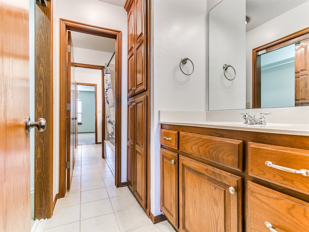 12400 Olivine Terrace, Oklahoma City, OK 73170 bathroom featuring vanity and tile flooring