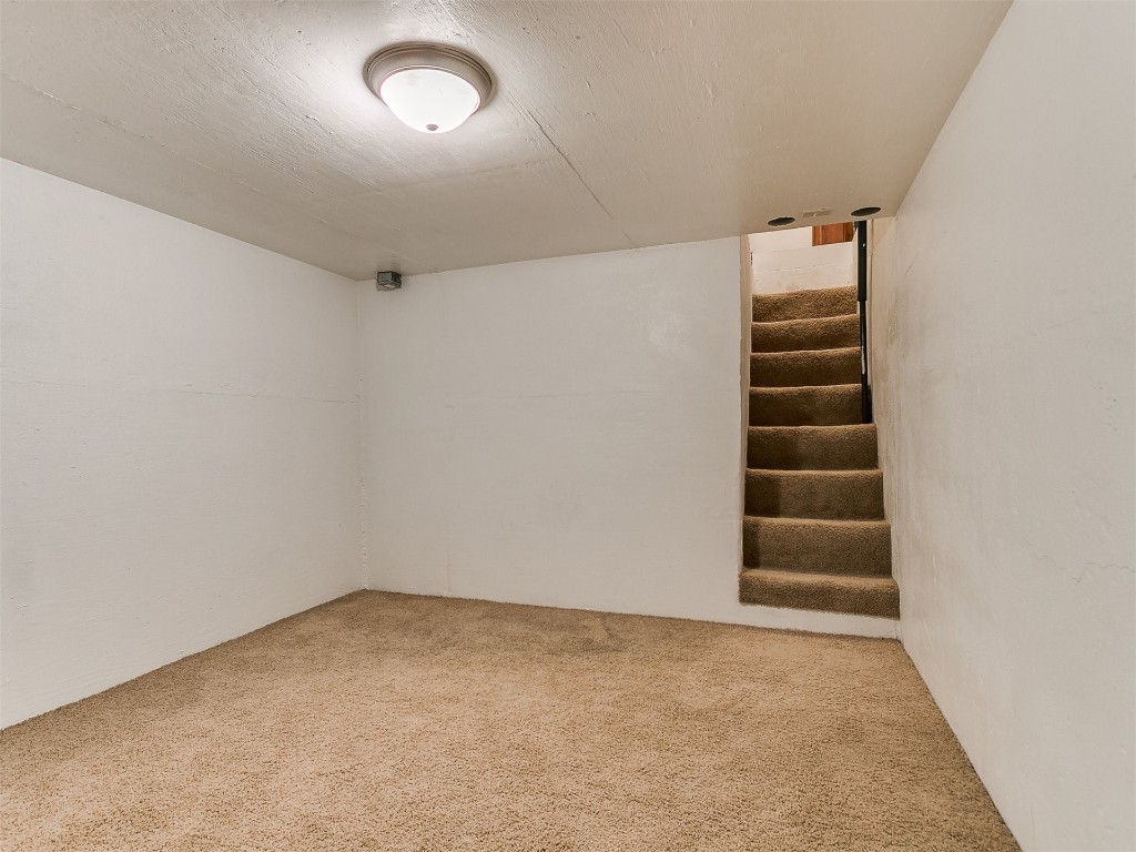 12400 Olivine Terrace, Oklahoma City, OK 73170 empty room with light colored carpet