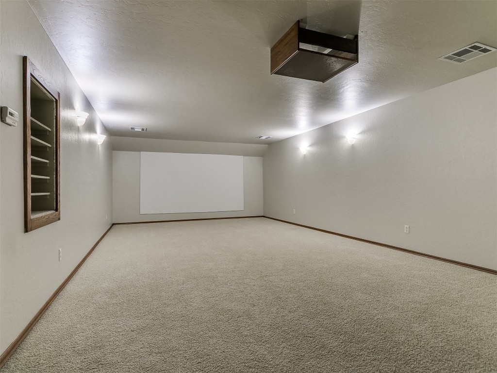 12400 Olivine Terrace, Oklahoma City, OK 73170 basement featuring light carpet