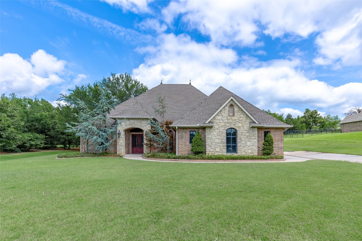 4508 Jacobs Lane, Choctaw, OK 73020 french provincial home with a front lawn