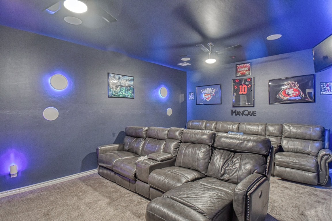 3935 Huntington Parkway, Choctaw, OK 73020 home theater room featuring carpet flooring and ceiling fan