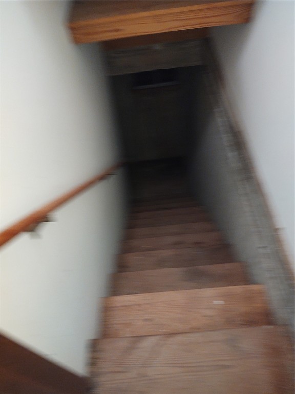 1240 COUNTY Road, Carnegie, OK 73015 staircase with dark hardwood / wood-style floors