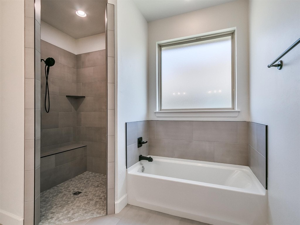 1226 Deer Ridge Boulevard, Tuttle, OK 73089 bathroom with shower with separate bathtub and tile flooring