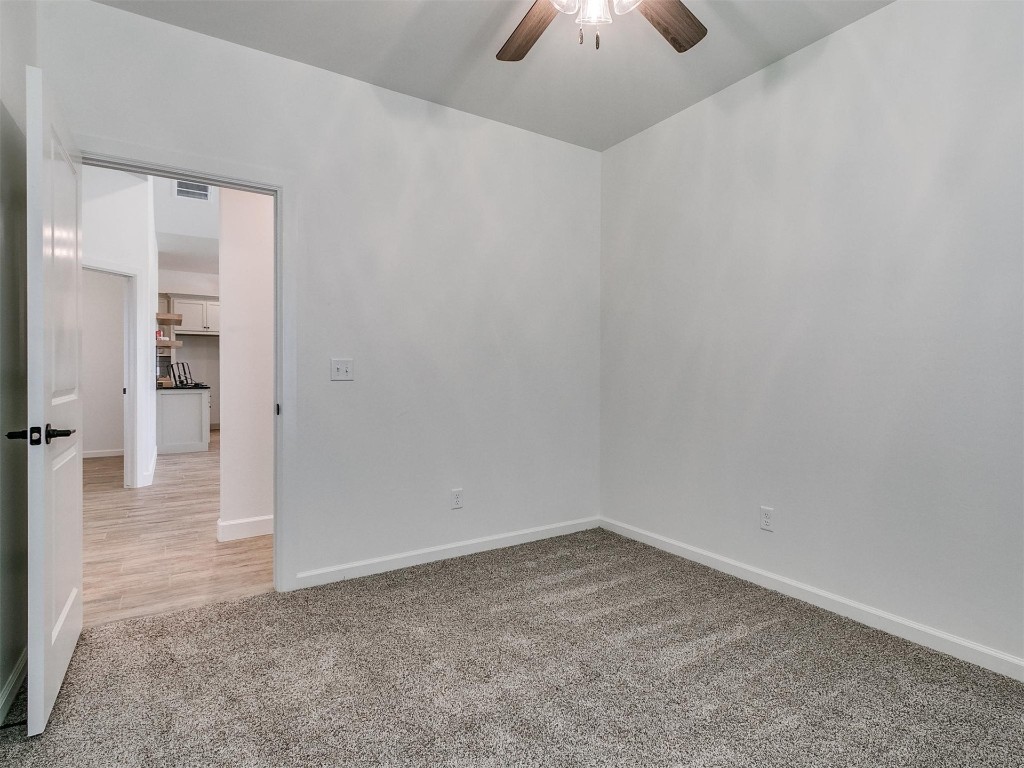 1226 Deer Ridge Boulevard, Tuttle, OK 73089 empty room with light hardwood / wood-style flooring and ceiling fan