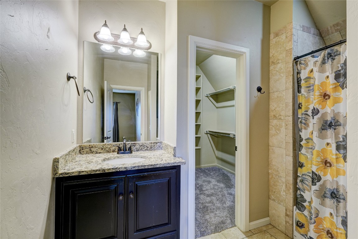 2355 La Belle Rue, Edmond, OK 73034 bathroom featuring oversized vanity and tile flooring