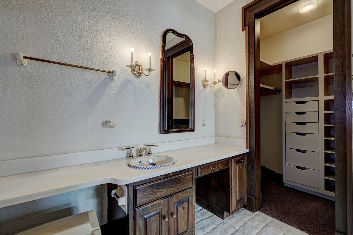 3900 S Bryant Avenue, Edmond, OK 73013 bathroom with oversized vanity