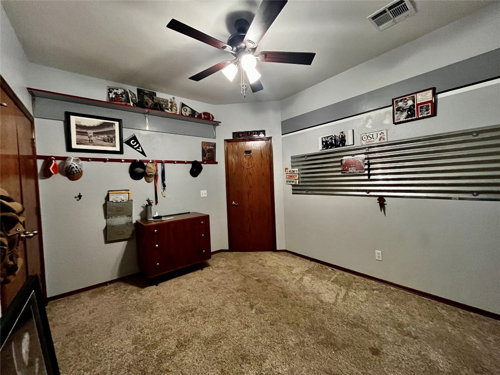 5808 E McMillin Dr, Tuttle, OK 73089 interior space featuring ceiling fan