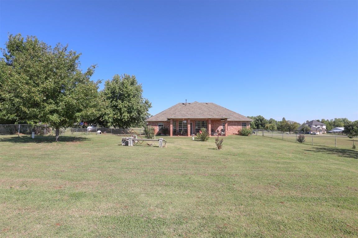 5808 E McMillin Dr, Tuttle, OK 73089 view of yard