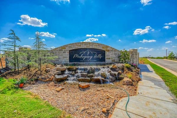 New residential community with rolling hills, wooded areas, and water.  If you're looking to build your next dream home in a prime location, this is it!  This amazing 1/2 acre lot within minutes of Moore or Norman won't last long.
Directions: From I-35 & Indian Hills Rd head EAST until S. Bryant Ave (turn left) & follow to S. Broadway Ave. Turn left on S Broadway Ave & follow approx. .2 miles to the entrance of Mahogany Hills.