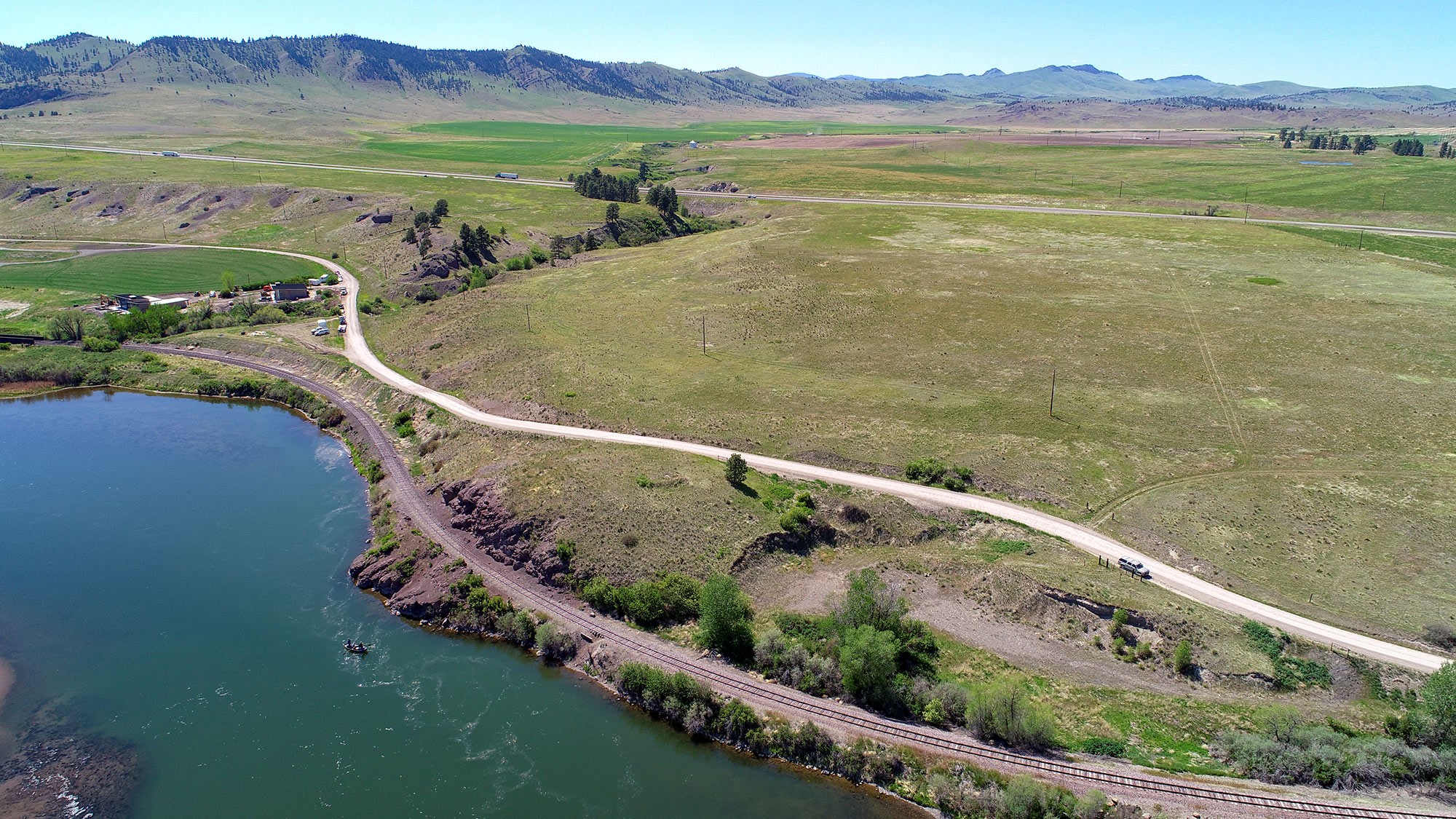 Invest in a hard-to-come-by 14 acres in the fly fishing destination Craig, Montana. The acreage offers phenomenal Missouri River and canyon views and is just off the paved Craig River Road with close proximity to town and services. The acreage is unique because it is divided by the road, so you have acreage almost ON the river with the bulk of the acreage on the hill above.  Let your imagination go wild with uses since there is NO ZONING and Craig is not an incorporated city, so no strict city rules. Build multiple houses on each lot? Take advantage of the high visibility above the river and build a commercial entity. Call Lynn Kenyon at 406-770-0013 or your real estate professional. Build your dream home on one side and use the other side for commercial. The possibilities are really endless and the traffic to Craig is brisk. Buyer to confirm all uses with county and state planning and health departments. Craig brings in thousands to fly fish and float on the river and recreate at nearby Holter Lake. Craig is nearly half way between Helena and Great Falls, so commutable. Buyers to verify all representations to their own satisfaction.
