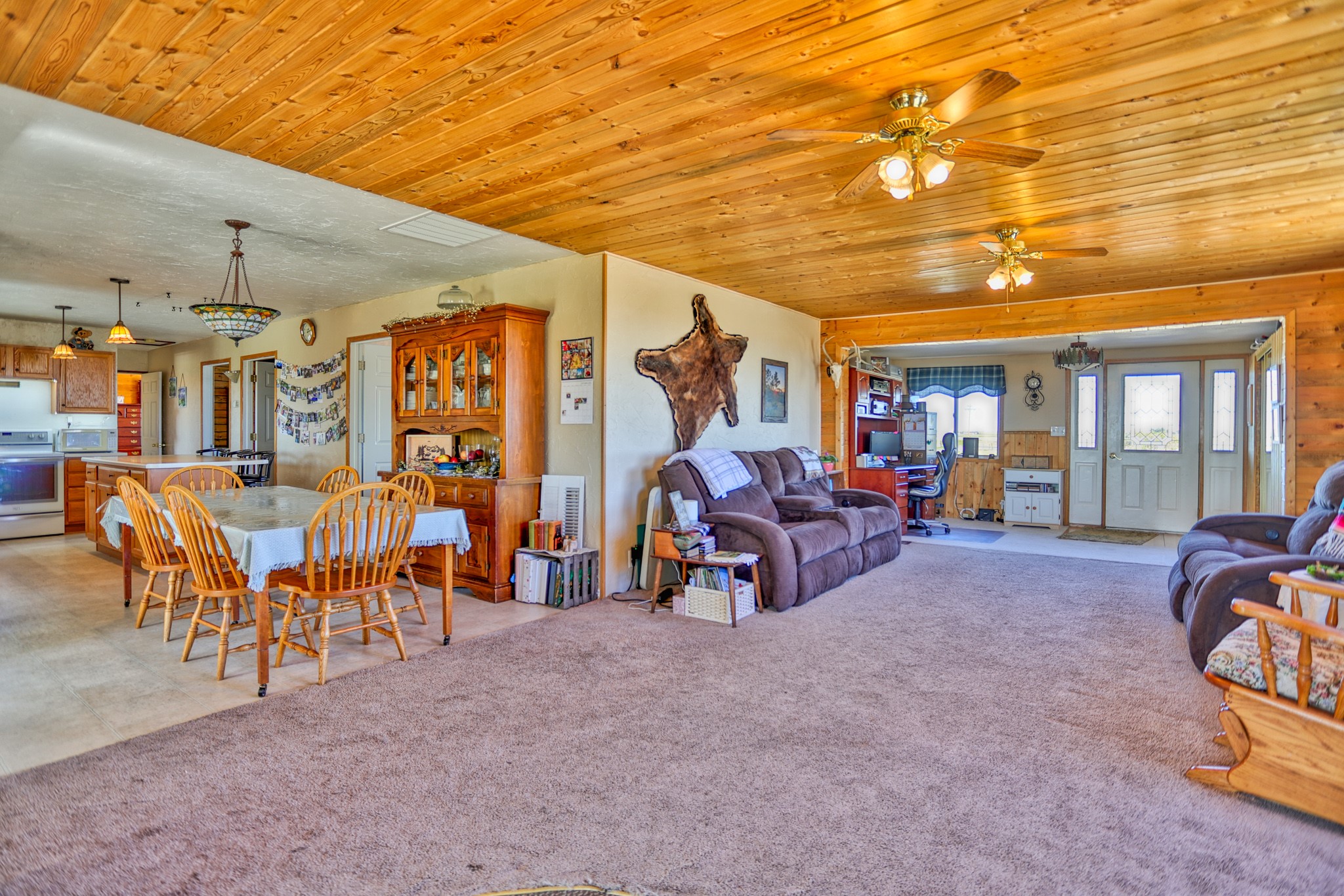 GREAT PRICE, PLUS $5,000 SELLER CREDIT AT CLOSING UPON ACCEPTABLE OFFER to update flooring as you choose!!  Bring your horses home to 5 irrigated acres on the Fairfield bench!  Inside, custom tongue and groove finishes make this single level warm and cozy while large windows throughout add lots of light!  Many recent updates include:  2018 18-20in of insulation added to attic & crawlspace plus furnace with cold air return and vents.  2019 roof and master bath remodel.  2020 dishwasher and main well pump.  2021 bedroom 1 remodel.  2022 new backyard well pump, water heater, bedroom 2 remodel, exterior door, new gravel driveway and parking area, east and north side porches and concrete patio.  RV parking spot w electrical hookup and water on west side.  This little gem is just waiting for your finishing touches!  Listed by Jen Barnett.