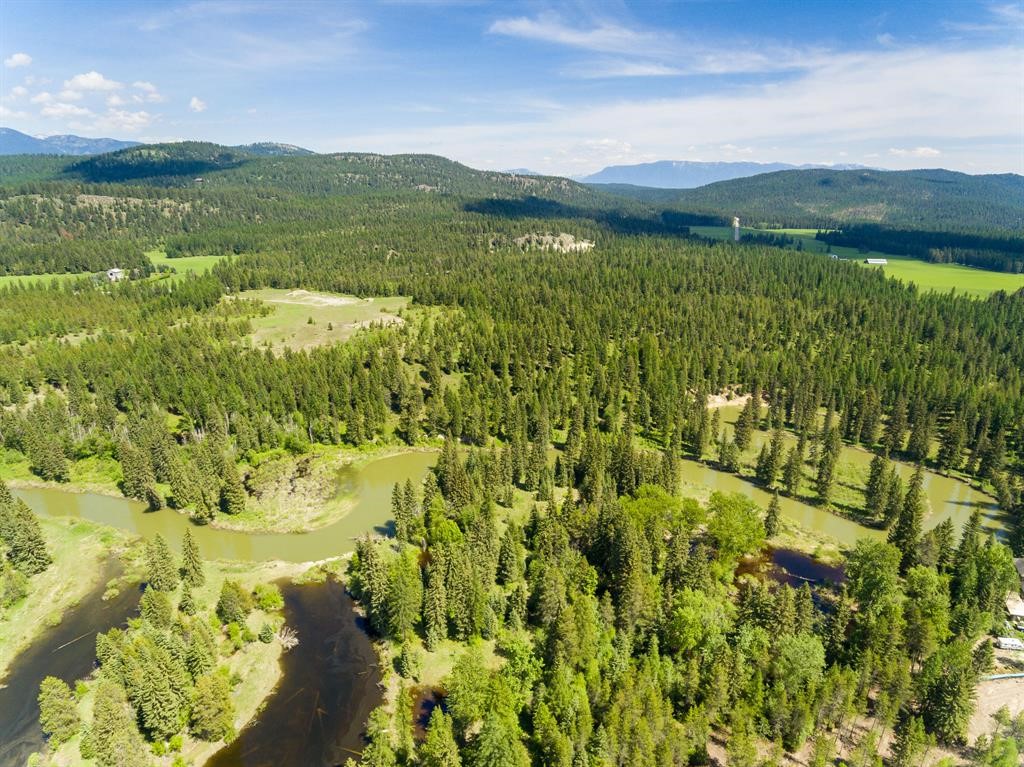 This stunning, large acreage is prime for development, or a large estate. Significant Stillwater River frontage runs the entire southern boundary of the property. Located just over 5 miles from the heart of Whitefish - it's an easy 8 minute car ride.  This very private property has large bluffs with open meadows, a variety of healthy, mature trees, a long winding stretch of river, and mountain views in every direction. You will not find another 95.9 acres like this.  Zoned scenic corridor on one portion, and no zoning on the other. Some engineering and pre-development has commenced. Contact Katherine Conrad at 406-249-4747 or Marcus Duffey at 406-871-5141, or your real estate professional. Tract 1 of Certificate of Survey No. 20887, A Tract of Land located in the East half of the Southwest quarter, and in the Southwest quarter of the Southeast quarter of Section 31, Township 31 North, Range 22 West, P.M.M., Flathead County Montana. Excepting therefrom that portion conveyed to the Montana Department of Transportation in bargain and sale Deed recorded May 18, 2021, as document no. 202100017312, records of the Flathead County, Montana, Tract 2: Description line 71

It is recommended that all buyers and buyers' agents verify all the information provided to them regarding this property to their satisfaction. The information is provided by outside sources and deemed reliable but not warranted by the listing agent or listing office.