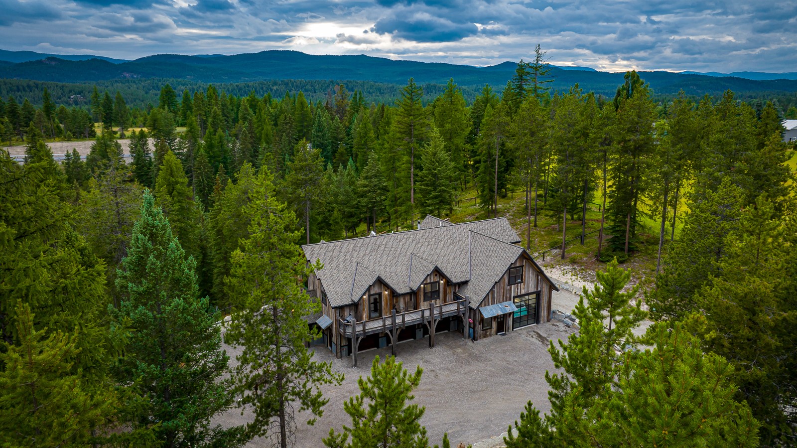 Live your Montana dream while building investment with the Grizzly Ridge Cabins! Tucked away on nearly 31 private acres just 10 minutes outside of Whitefish is a newly built 2,663 3-bedroom, 2-bathroom primary residence w/ 3,200 sf of garage/shop space below & accompanied by FIVE breathtaking cabins, each unique unto itself on this beautifully parked out wooded property. Make this a multigenerational family property for years to come or live in this scenic recreational wonderland with 5 separate potential income streams. Three of five cabins are fully complete, turnkey, 1,090 sf each, w/ 3 beds, 1.5 baths & the remaining two are under construction, nearing completion & 1,200 sf each, w/ 3 beds, 2 baths & each cabin complete with AC. Within minutes of N Spencer Mountain Trailhead, Spencer Lake & under 10 minutes to Downtown Whitefish, Whitefish Lake & Whitefish Lake Golf Course, options for outdoor play are endless! Call Sean 406-253-3010 or your real estate professional for more info.