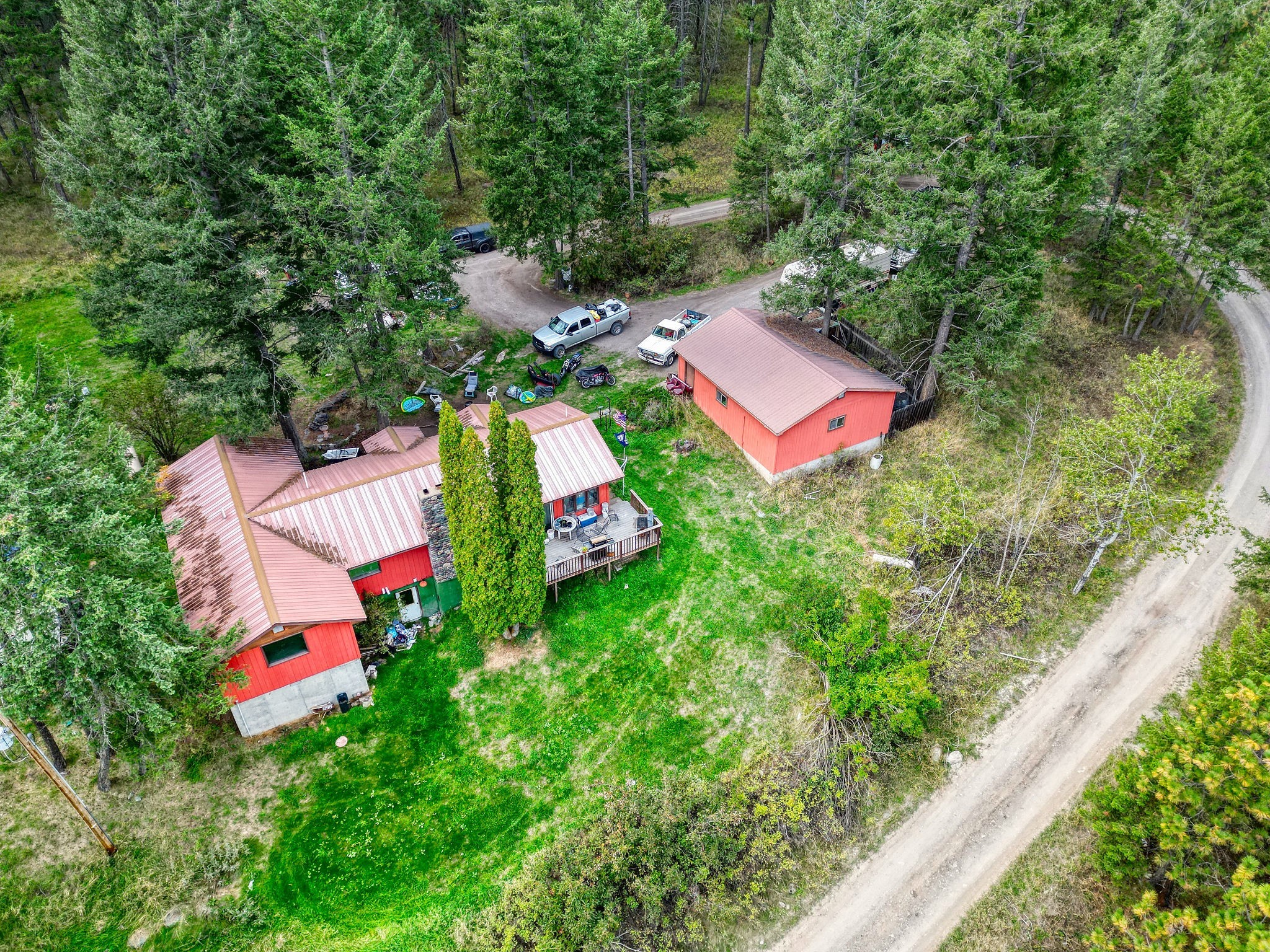 This remarkable 14.5-acre parcel offers an unparalleled opportunity for a slice of paradise close to downtown Bigfork, with no restrictive covenants or HOA and INVESTOR building potential. With access right off Highway 35, you have a short drive to Flathead Lake, Whitefish Ski Resort, Glacier Park & G.N. Airport! On the upper bench of the property sits a fixer-upper 3 bed, 2 bath home and garage with its own private well and permitted septic. This property will be sold as-is, needs TLC, but provides impeccable Swan Mountain views. Contact Amanda Kelly at 406-407-3989, or your real estate professional, for more information. Showings by Appointment Only!