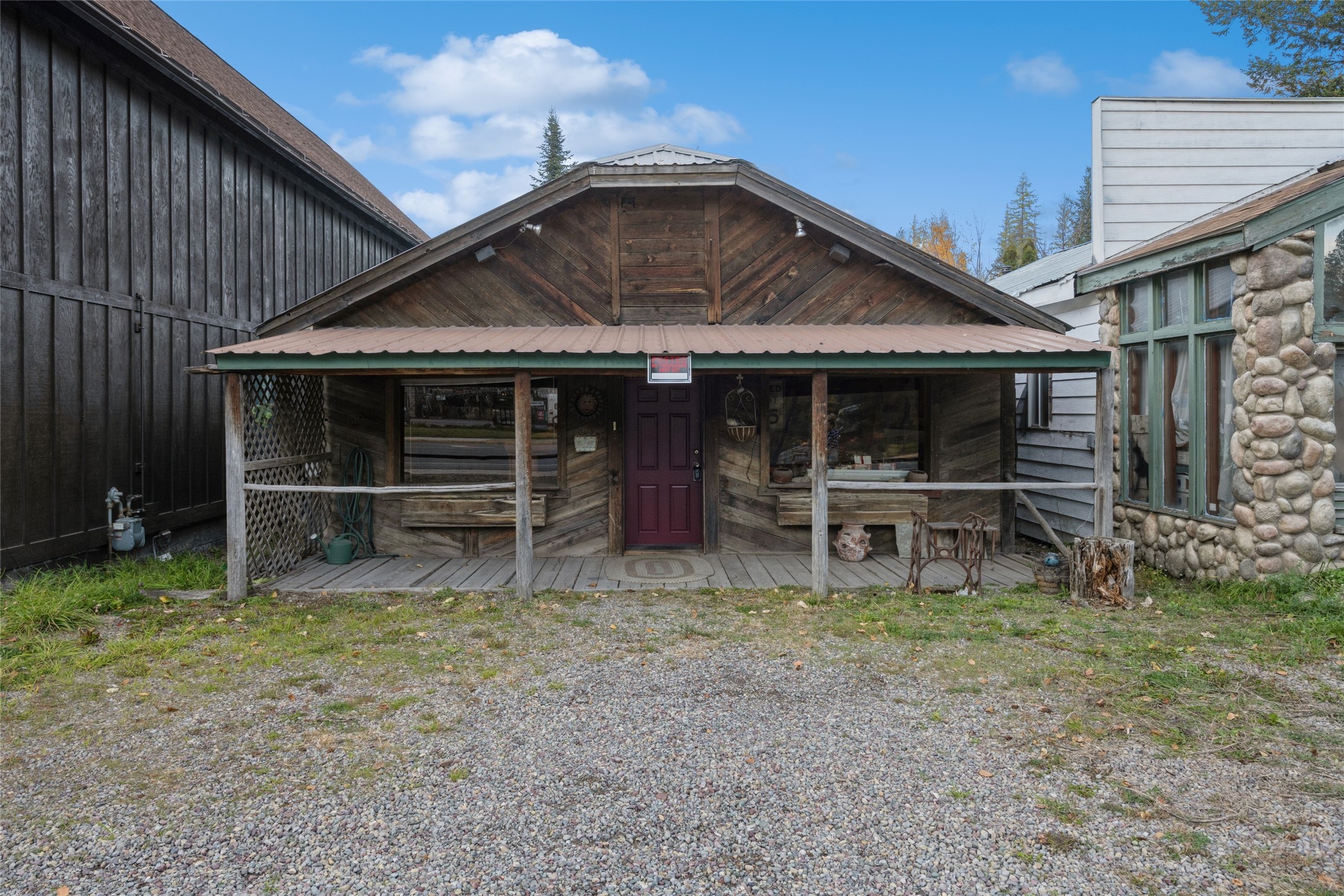 Here's an opportunity to own a little bit of Hungry Horse history! This historic log home used to be Frankie's Spillway Bar! It is minutes from Glacier National Park.  Bring your vision; this has unlimited potential—scenic corridor zoning!  The  Highway 2 East frontage has an average traffic count of over 8800 cars daily. The property is being sold in its present condition - As Is Where Is.  The seller is the estate's personal representative and a licensed real estate broker. Please call Dan Erickson at 406-261-5318, Jill Hinrichs at 406-253-0676, or your real estate professional.