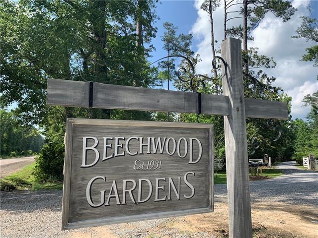 3.5 Acres to build your dream home in the gated, waterfront Beechwood Gardens! This one of a kind community features contemplative gardens with stone bridges, stone ladened creeks, mature tress, camellias, sasanqua camellias, ponds, walking trails, and acres of green space. All of this with white sandy beaches on the Bogue Falaya River and only minutes to downtown Covington.