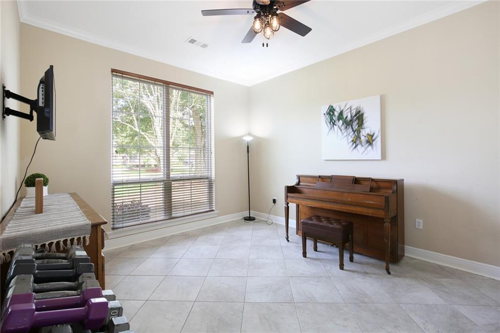 Formal Living Room which can be used for anything even a 5th BEDROOM. There is  closet door in hallway that could be used to enter this room and close off from foyer if using as a 5th bedroom.