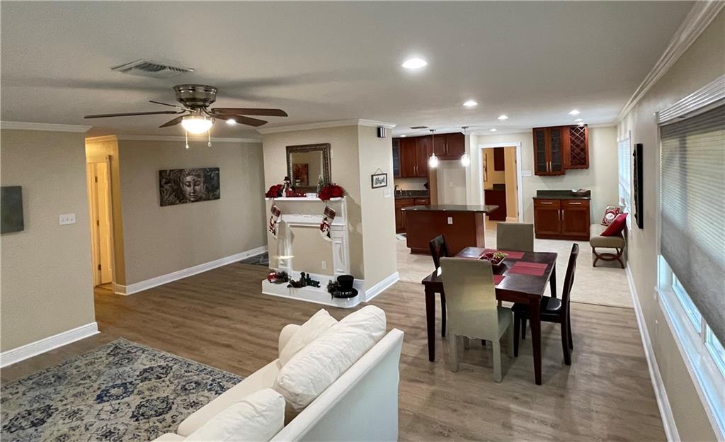 living room view to dining area and kitchen