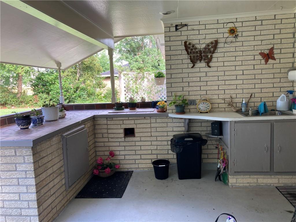 Outdoor serving area with sink