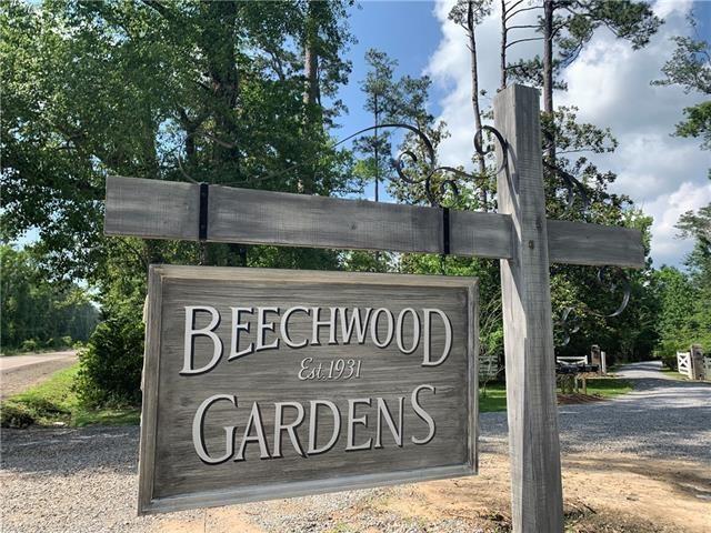 2.75 Acres to build your dream home in the gated, waterfront Beechwood Gardens! This one of a kind community features contemplative gardens with stone bridges, stone ladened creeks, mature tress, camellias, sasanqua camellias, ponds, walking trails, and acres of green space. All of this with white sandy beaches on the Bogue Falaya River and only minutes to downtown Covington.