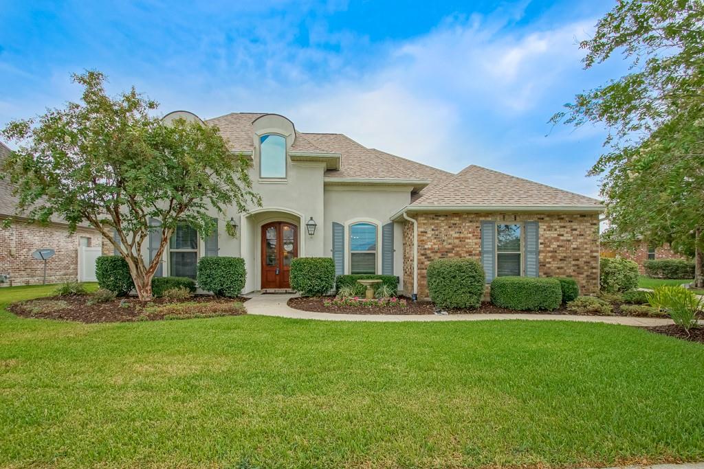 ***OPEN HOUSE ~ 9/17 ~ SUNDAY ~ 1 - 4 PM *** This stunning "Ashton Plantation" home features 4 bedrooms, 3 full baths, and an open, triple split floorplan. It is upgraded & updated and is ready for YOU to call it HOME. You'll be drawn in from the moment you arrive @ the curb appeal of the luxurious, custom landscaping. The double entry doors welcome you into the foyer which opens to the living room & formal dining room boasting high tray ceilings, crown molding, a mosaic marble fireplace surround, pediment columns, wooden window casings, and transom windows above the doors. The interior has been updated with new wood-look tiled flooring, gorgeous custom cabinetry, a hidden trash bin drawer, and a center island between the kitchen and the breakfast area. You'll enjoy all new, upgraded SS (energy saver) appliances, and new (LED) lighting throughout the home. The over-sized, spa-like primary suite includes double closets, ample counter tops and cabinetry, double vanities, and a jetted tub. The exterior and has been upgraded as well. The 16 x 22 covered patio has been screened in with multiple sliding screened doors to accommodate your entertaining style of the day. Not only has luxurious landscaping been added to the backyard as well, but custom designed pavers have been added to extend the backyard entertaining area & now includes a firepit and an outdoor kitchen/bar. The outdoor kitchen was planned and built with galvanized steel and cement board construction for fire resistance/longevity. An additional parking pad, extending the driveway has also been added by the Seller. Currently used for boat storage. // Roof replaced 2021.// Located in sought after, preferred flood zone X. // Conveniently located approximately 12 miles from Metairie.