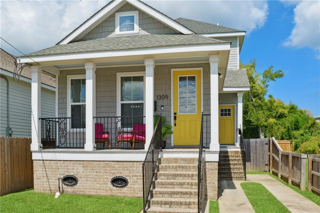 Located minutes from Bayou St. John, City Park and the Lakefront, this gorgeous 3bed/2.5 bath home is just 4 years young! Enjoy relaxing on your covered front porch or entertaining on the huge rear deck ideal for those who love to host a party! The floor plan is open and inviting.  The kitchen anchors the home, featuring ss appliances, marble counters and plenty of cabinetry. The large primary bathroom has a fantastic en-suite bath with a deep soak bathtub. This home offers an abundance of storage, spacious bedrooms, a second entry that can be used a mudroom or even an office nook. The back yard has great potential and room for a pool! Schedule your private showing today!